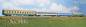Preview: ACME AC553322 - 4-tlg. Set Personenwagen "Hoek van Holland - Warszawa Express" der DR
