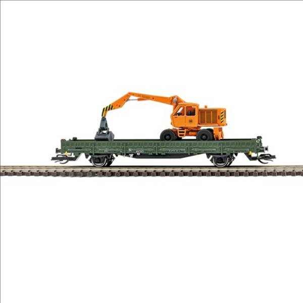 Busch 31516 - Bauzugwagen mit Rungen Ks [3300] der DR, beladen mit Bagger T-174